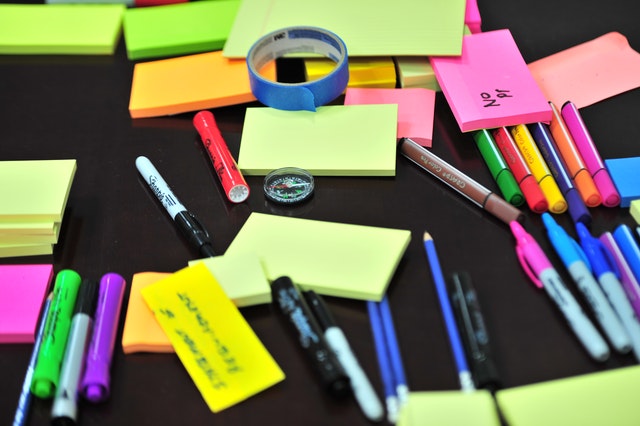 photo-of-sticky-notes-and-colored-pens-scrambled-on-table-632470-2